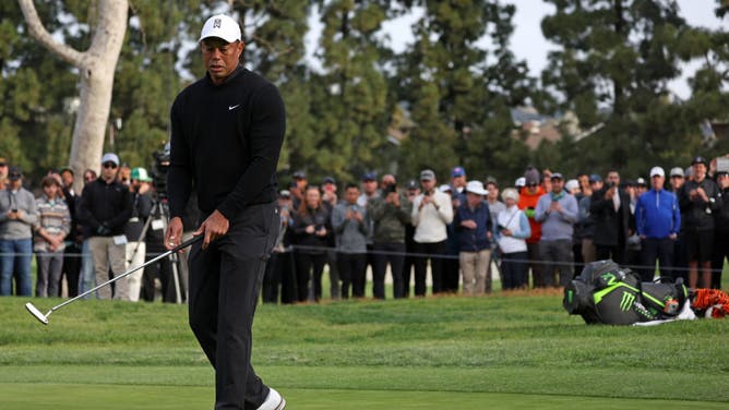 Tiger Woods reacts to a missed birdie putt on the 11th green during the 2nd round of the The Genesis Invitational at Riviera Country Club in Pacific Palisades, California.
