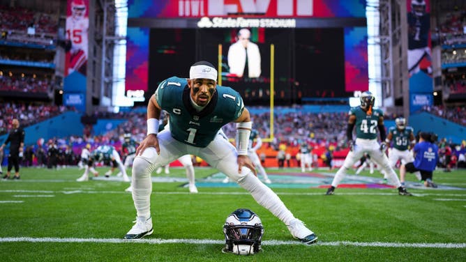 Jalen Hurts of the Philadelphia Eagles warms up against the Kansas City Chiefs after Super Bowl LVII.