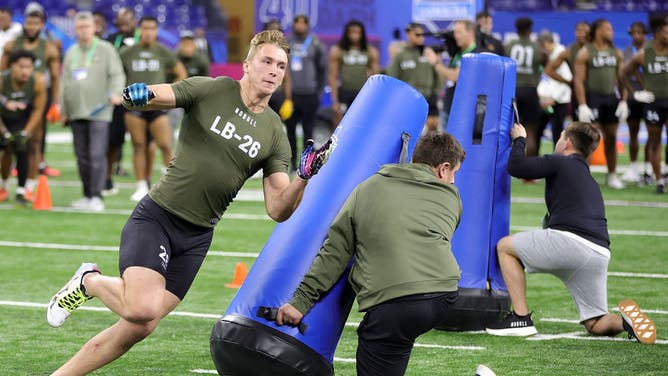 Linebacker Drew Sanders of Arkansas participates in a drill during the Scouting Combine ahead of the NFL Draft.