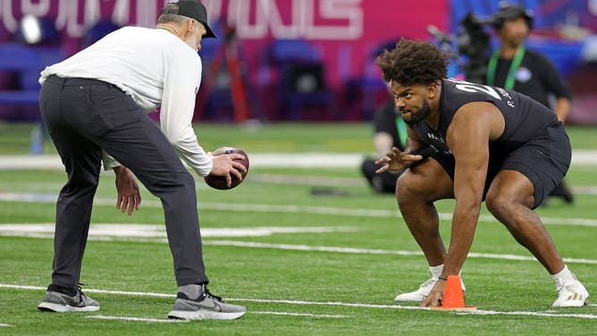 Paris Johnson Jr. of Ohio State participates in a drill during the Scouting Combine ahead of the NFL Draft.