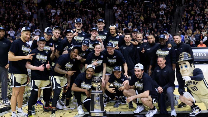 The Purdue Boilermakers celebrate winning the Big Ten Championship after the game against the Illinois Fighting Illini at Mackey Arena in West Lafayette, Indiana.