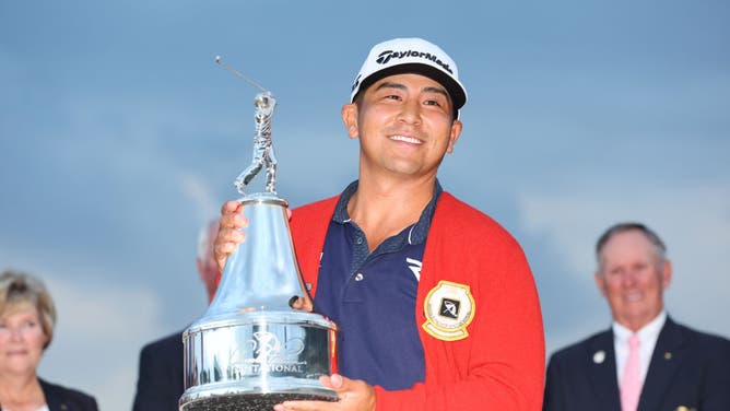Kurt Kitayama celebrates with the trophy after winning the PGA Tour's Arnold Palmer Invitational presented by Mastercard, shown on NBC.