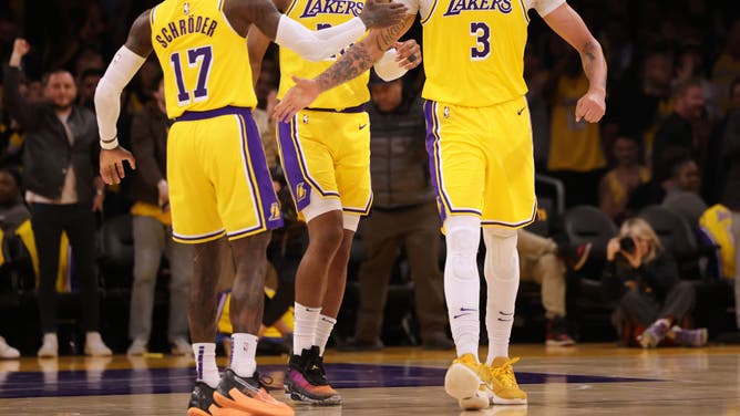 Anthony Davis celebrates his basket with teammates in the Lakers' win over the Memphis Grizzlies at Crypto.com Arena in Los Angeles.