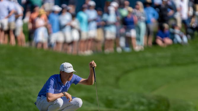 Ben Griffin looks down the line before attempting his putt during the third round of THE PLAYERS Championship at TPC Sawgrass in Ponte Vedra Beach, Florida.