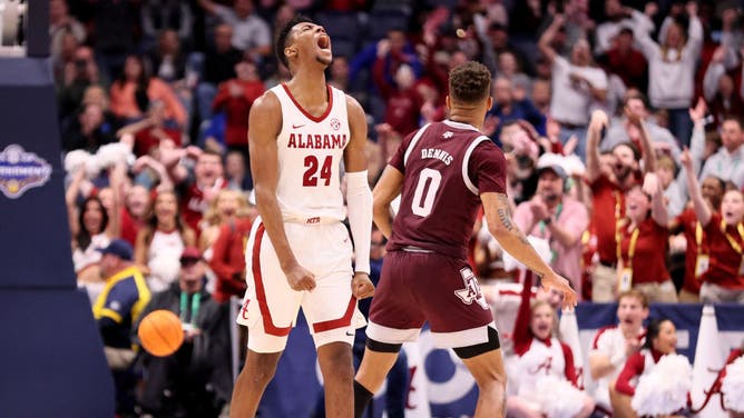 Brandon Miller #24 of the Alabama Crimson Tide celebrates the SEC Basketball Tournament. Alabama is the top-seeded team in the South Region in the NCAA Tournament bracket.