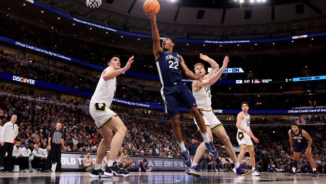 Penn State's Jalen Pickett takes a layup against Purdue during the Big Ten Basketball Tournament Championship at United Center in Chicago.