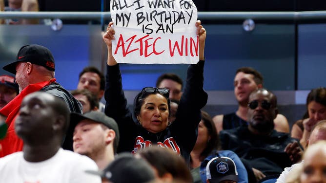 A San Diego State Aztecs fan holds up a sign against the Charleston Cougars during the first round of the NCAA Men's Basketball Tournament at Amway Center in Orlando, Florida.
