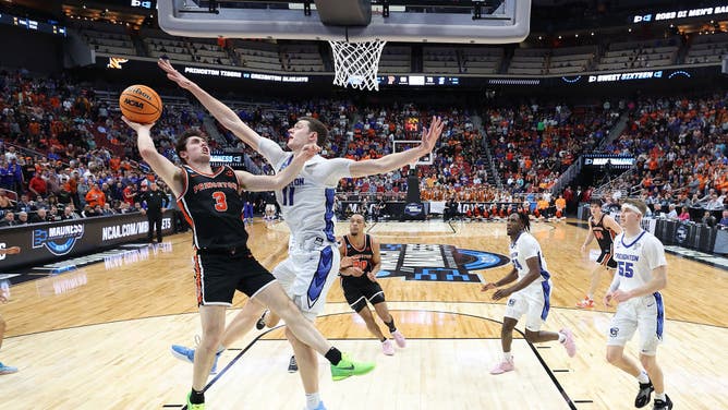 Princeton SG Ryan Langborg is met at the basket by Kalkbrenner in the Sweet 16 of the NCAA Tournament 2023 at KFC YUM! Center.
