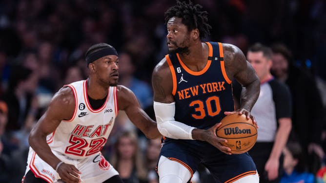 New York Knicks PF Julius Randle is guarded by Miami Heat wing Jimmy Butler at Madison Square Garden.