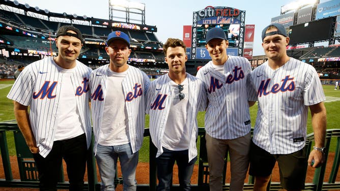 New York Islanders Adam Pelech, Josh Bailey, Anthony Beauvillier, Scott Mayfield and Ross Johnston attend a New York Mets game.