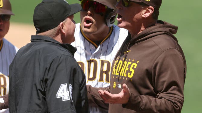 San Diego Padres Bob Melvin argues with umpire Ron Kulpa after Kulpa called Manny Machado out on a pitch clock violation.