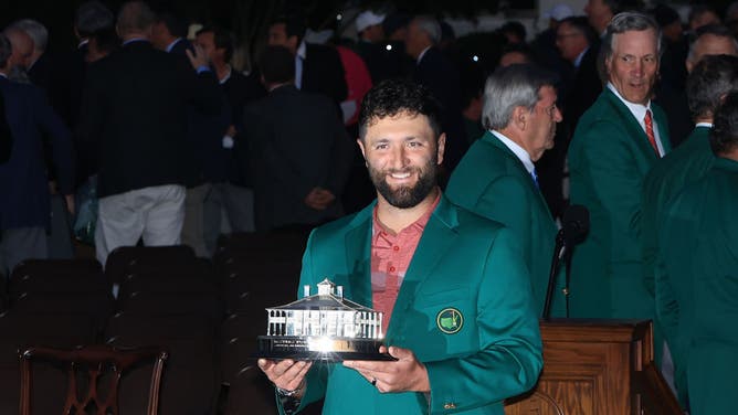 Jon Rahm of Spain poses in his green jacket with the trophy after the final round of the 2023 Masters Tournament at Augusta National Golf Club on April 09, 2023 in Augusta, Georgia.