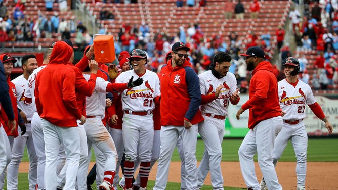 The St. Louis Cardinals celebrate a 10th inning walk-off victory vs. Pittsburgh Pirates at Busch Stadium in St. Louis, Missouri.