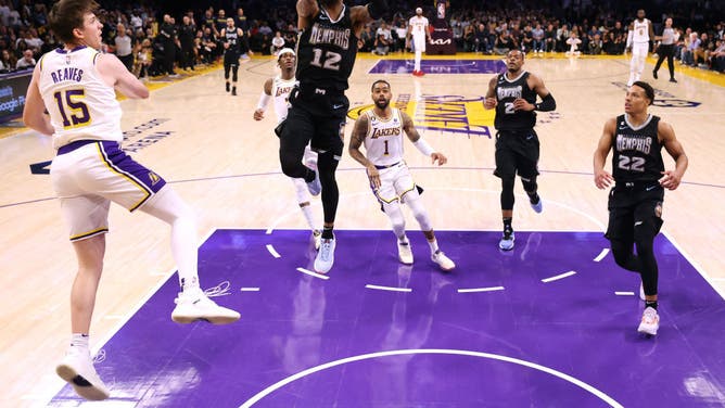 Memphis Grizzlies PG Ja Morant goes up for a layup against the Lakers during an NBA game at Crypto.com Arena in Los Angeles.