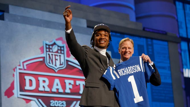 Anthony Richardson poses with NFL Commissioner Roger Goodell after being selected fourth overall by the Indianapolis Colts during the first round of the 2023 NFL Draft.