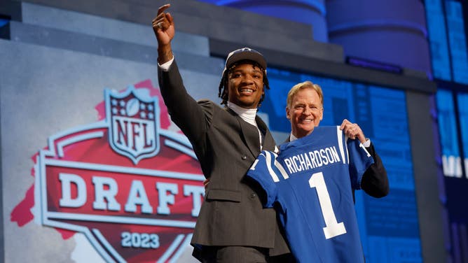 Anthony Richardson poses with NFL Commissioner Roger Goodell after being taken 4th by the Indianapolis Colts in the 2023 NFL Draft at Union Station in Kansas City, Missouri.