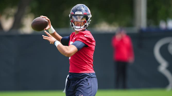 Texans QB C.J Stroud throws during the first day of rookie minicamp at NRG Stadium in Houston.