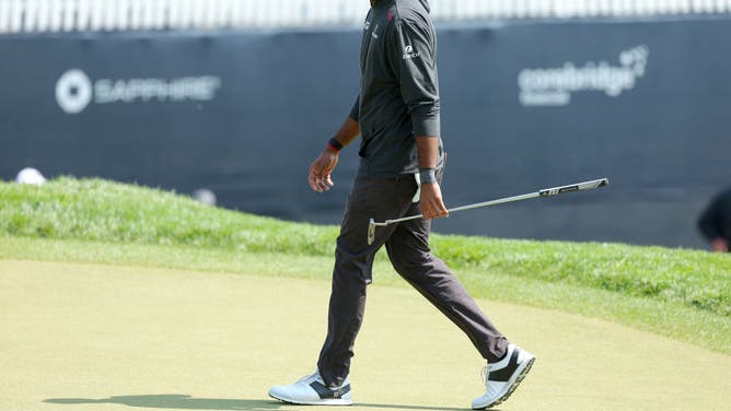 Sahith Theegala looks on from the 18th green during the 1st round of the 2023 PGA Championship at Oak Hill Country Club.