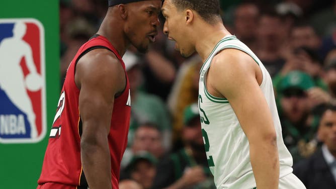 Heat SF Jimmy Butler exchanges words with Celtics PF Grant Williams during the 4th quarter in Game 2 of the Eastern Conference Finals at TD Garden in Boston.