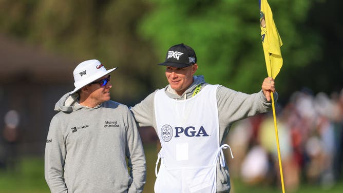 Joel Dahmen of The United States prepares to putt on the first hole with his caddie Geno Bonnalie during the final round of the 2023 PGA Championship.