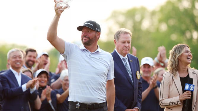 Michael Block of the United States, PGA of America Club Professional, celebrates after being awarded with Low Club Professional trophy after the final round of the 2023 PGA Championship at Oak Hill Country Club on May 21, 2023 in Rochester, New York.