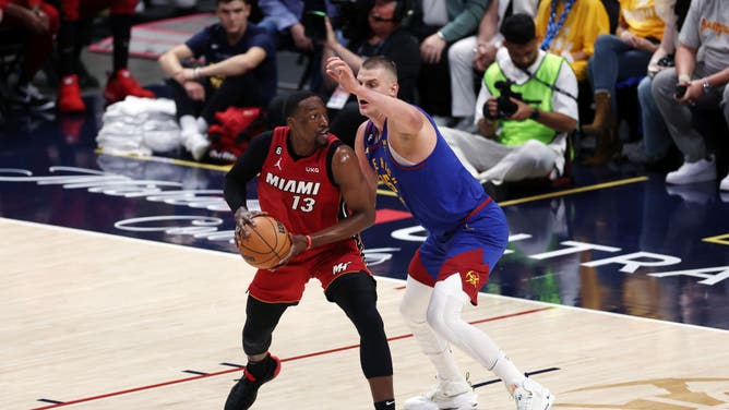 Denver Nuggets C Nikola Jokic defends Miami Heat C Bam Adebayo in Game 1 of the 2023 NBA Finals at Ball Arena in Colorado.