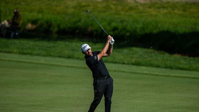 Patrick Cantlay hits his second shot on hole 18 during the 2023 Memorial Tournament presented by Workday at Muirfield Village Golf Club in Dublin, Ohio.