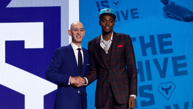 Former Alabama forward Brandon Miller poses with NBA commissioner Adam Silver after being drafted 2nd by the Charlotte Hornets in the 2023 NBA Draft at Barclays Center in the Brooklyn.