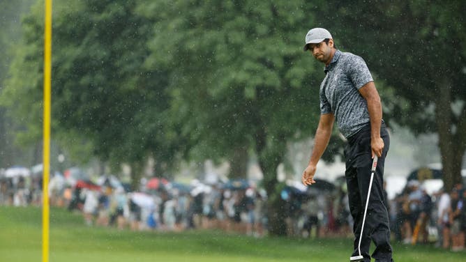 Aaron Rai of England reacts to his missed putt on the 13th green during the final round of the Rocket Mortgage Classic at Detroit Golf Club in Michigan.