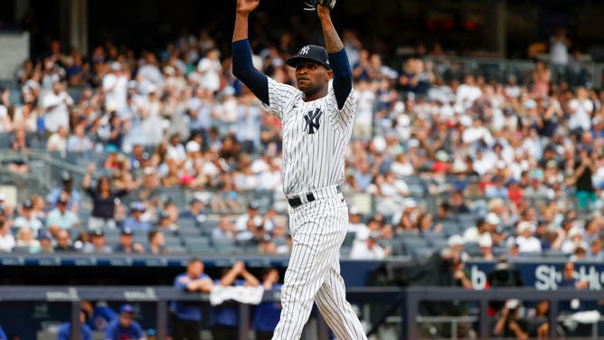 Yankees starting pitcher Domingo Germán gestures to the crowd during a game vs. the Chicago Cubs at Yankee Stadium.
