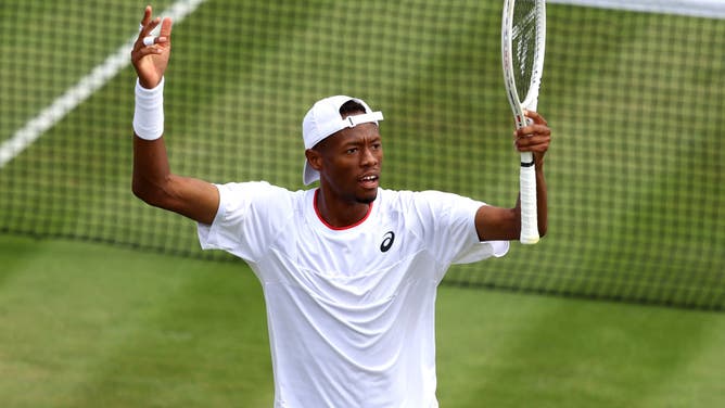 Christopher Eubanks of United States celebrates against Stefanos Tsitsipas of Greece during The Championships Wimbledon 2023.