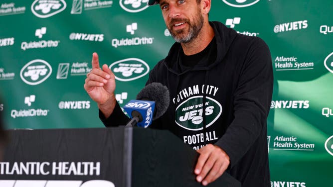 The New York Jets and Aaron Rodgers agreed to a restructured contract that helps the team save money against the NFL's salary cap.