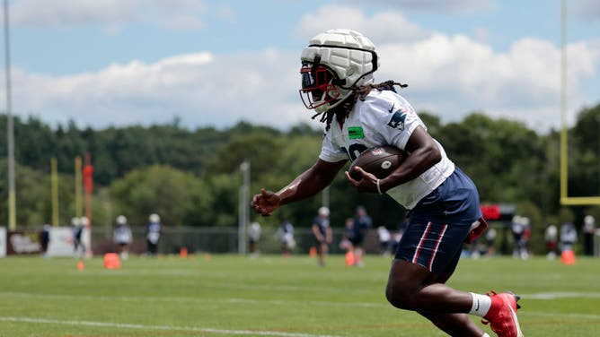 New England Patriots RB Rhamondre Stevenson is not yet practicing fully at training camp and says only Bill Belichick knows why.