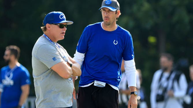 Colts coach Shane Steichen speaks with general manager Chris Ballard at Indianapolis Colts Training Camp at Grand Park Sports Campus in Westfield, Indiana.