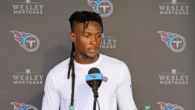 Titans WR DeAndre Hopkins answers questions during Tennessee's training camp.