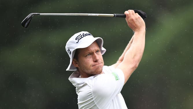 eter Malnati of the United States plays a shot during the first round of the Wyndham Championship at Sedgefield Country Club.