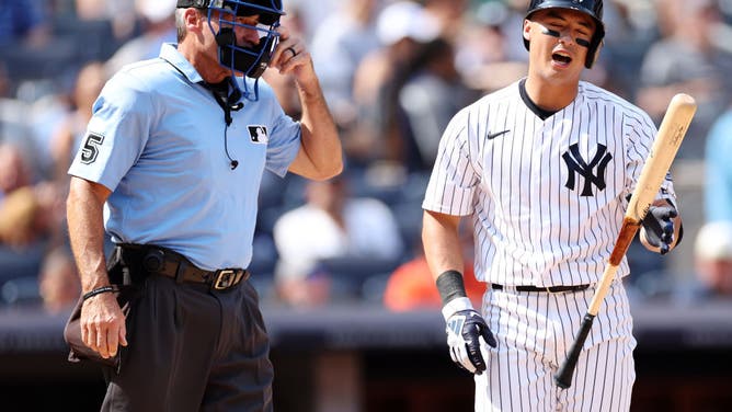 Anthony Volpe of the New York Yankees reacts after a call made by home plate umpire Angel Hernandez during the fifth inning of an MLB game against the Houston Astros at Yankee Stadium.