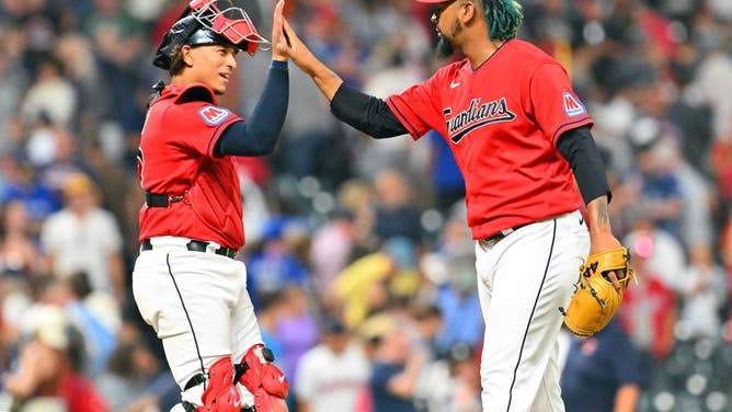 Guardians C Bo Naylor celebrates with closer Emmanuel Clase after defeating the Toronto Blue Jays at Progressive Field in Cleveland.