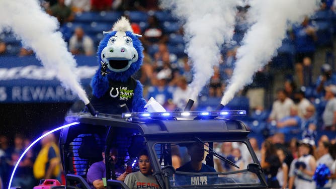 Indianapolis Colts mascot Blue brings the game ball onto the field during a preseason game between the Chicago Bears and the Indianapolis Colts on August 19, 2023 at Lucas Oil Stadium in Indianapolis, IN.