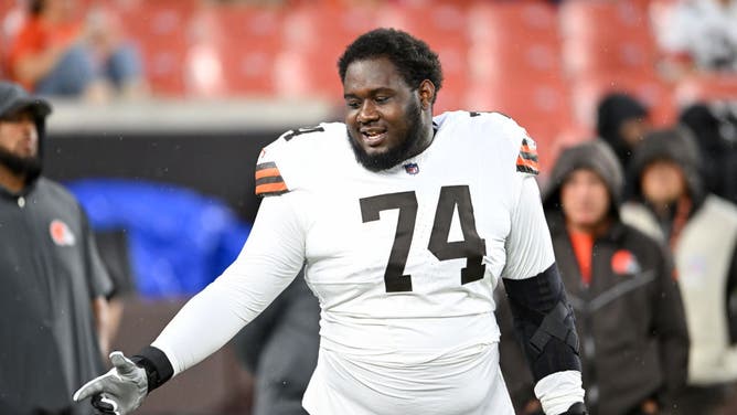 Dawand Jones of the Cleveland Browns warms up prior to a preseason game against the Washington Commanders at Cleveland Browns Stadium on August 11, 2023 in Cleveland, Ohio.