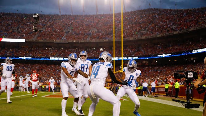 Detroit Lions WR Amon-Ra St. Brown celebrates his TD with teammates vs. the Chiefs in the 2023 NFL Kickoff Game
