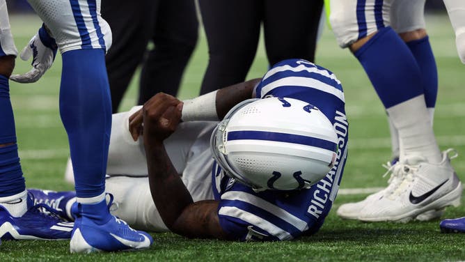 Anthony Richardson #5 of the Indianapolis Colts waits for training staff after being injured on play in the fourth quarter of a game against the Jacksonville Jaguars at Lucas Oil Stadium on September 10, 2023 in Indianapolis, Indiana.