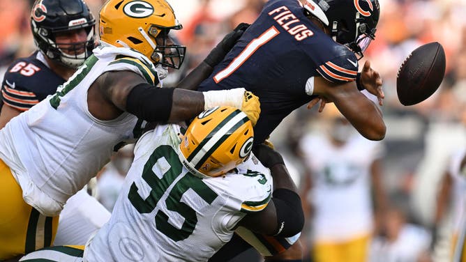 Justin Fields of the Chicago Bears fumbles the ball against the Green Bay Packers.