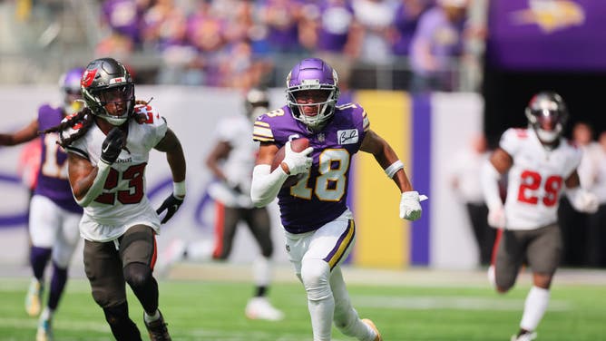 Vikings WR Justin Jefferson runs after a catch vs. the Buccaneers at U.S. Bank Stadium in Minneapolis.