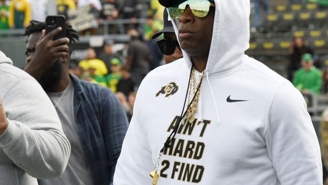 Colorado Buffaloes head coach Deion Sanders walks on the field for pre-game before the contest against the Oregon Ducks.