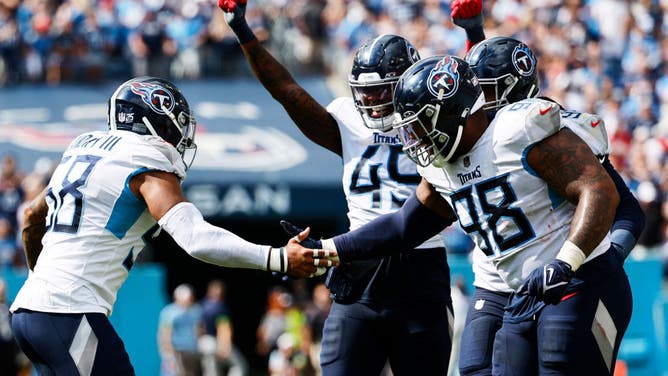 Tennessee Titans LB Harold Landry, DT Jeffery Simmons, edge rusher Arden Key celebrate vs. the Los Angeles Chargers at Nissan Stadium in Nashville.