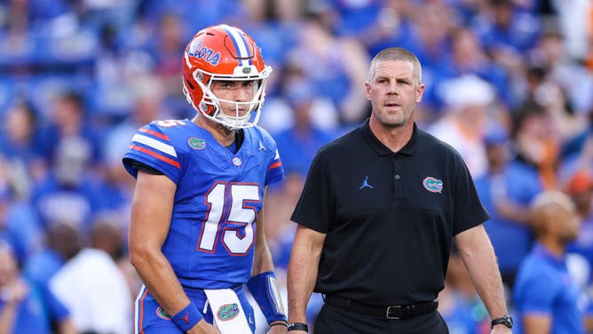 Florida Gators QB Graham Mertz and head coach Billy Napier before the game against the Tennessee Volunteers at Ben Hill Griffin Stadium in Gainesville, Florida.