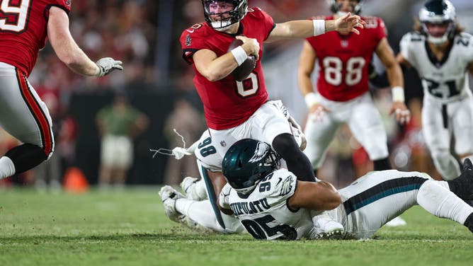 Buccaneers QB Baker Mayfield scrambles out of the pocket against the Philadelphia Eagles at Raymond James Stadium.