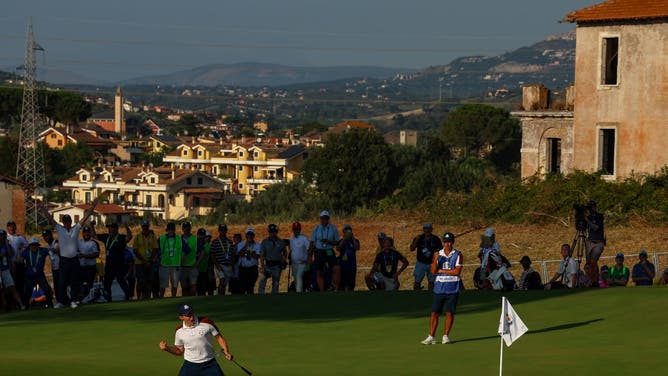 Matt Fitzpatrick of Team Europe celebrates a putt in the 2023 Ryder Cup at Marco Simone Golf Club in Rome, Italy.