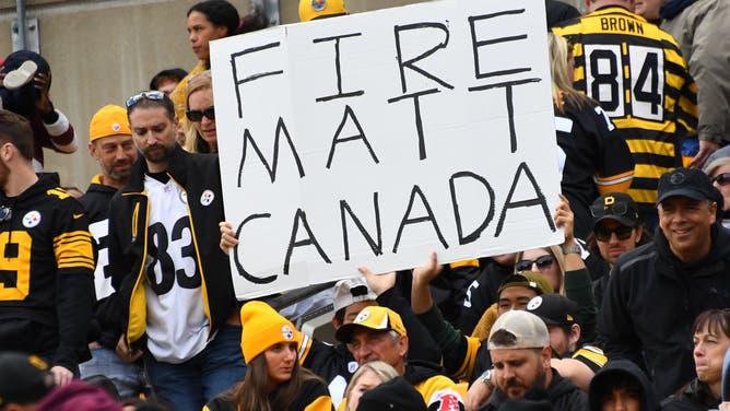 A Pittsburgh Steelers fan holds up a sign in reference to Pittsburgh Steelers offensive coordinator Matt Canada during the second half against the Baltimore Ravens at Acrisure Stadium on October 08, 2023 in Pittsburgh, Pennsylvania.